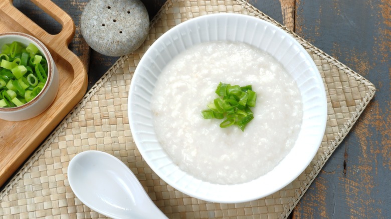 Bowl of congee with garnish