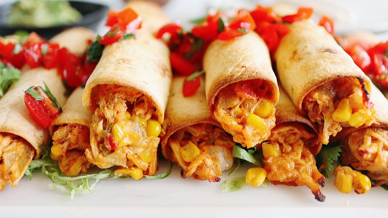 Close up of flautas on serving platter