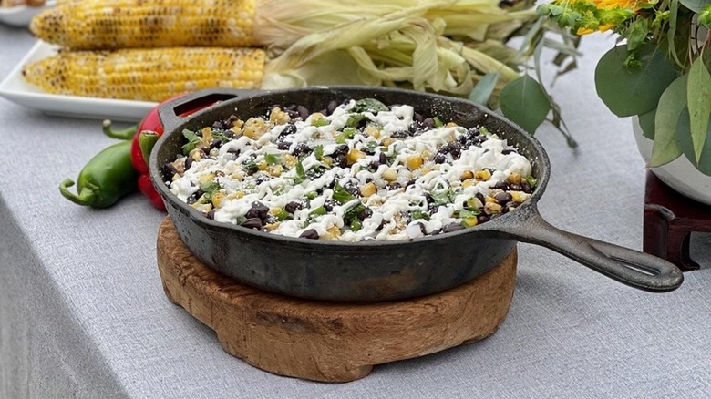 grilled corn and black beans in skillet