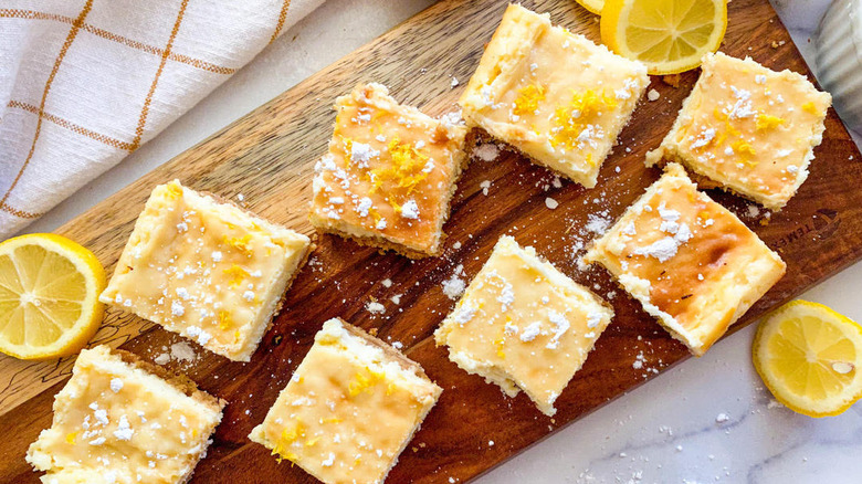 lemon cheesecake bars on platter