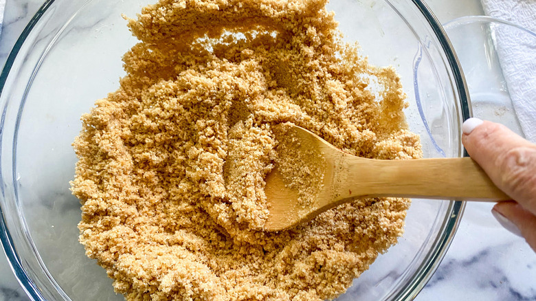 crushed graham crackers in bowl