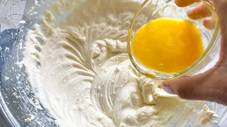 eggs pouring into white filling