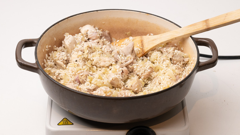 pan with rice and chicken