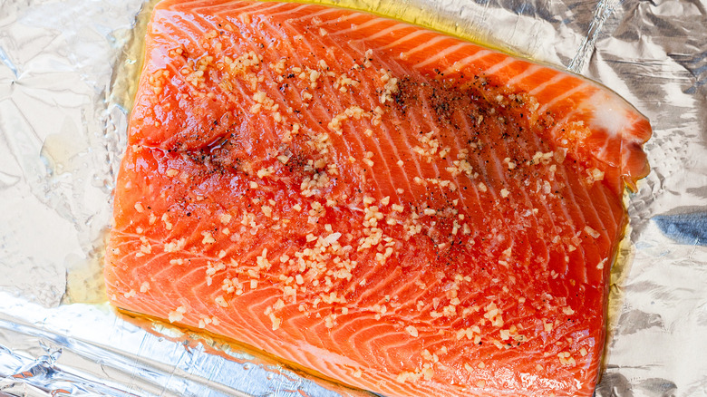 salmon with salt, pepper, and olive oil 