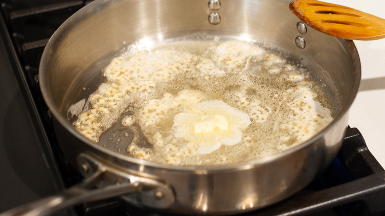 butter and garlic in pan