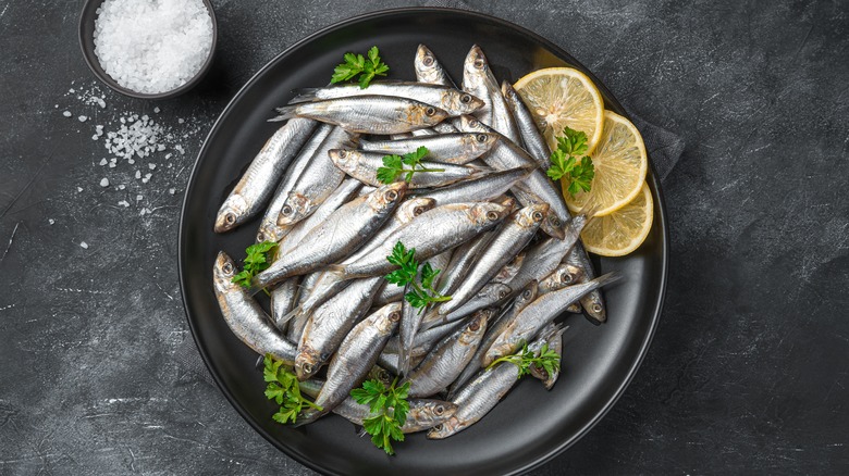 anchovies served with lemon