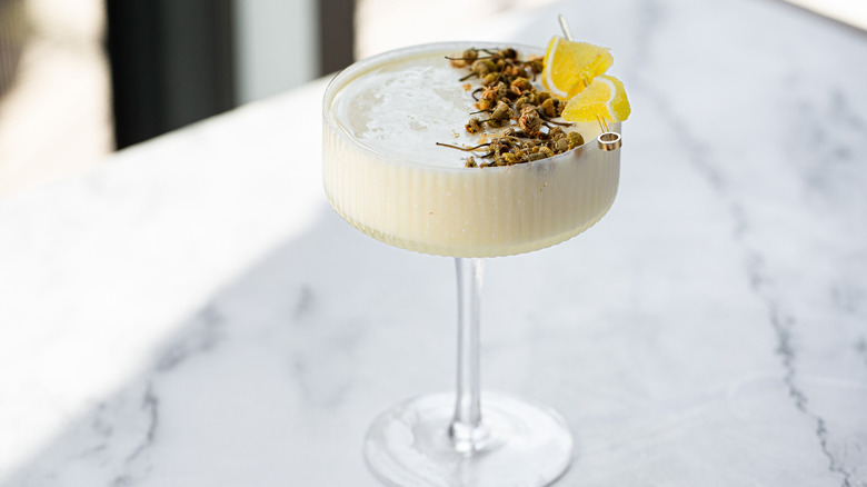 drink on marble counter with window in background