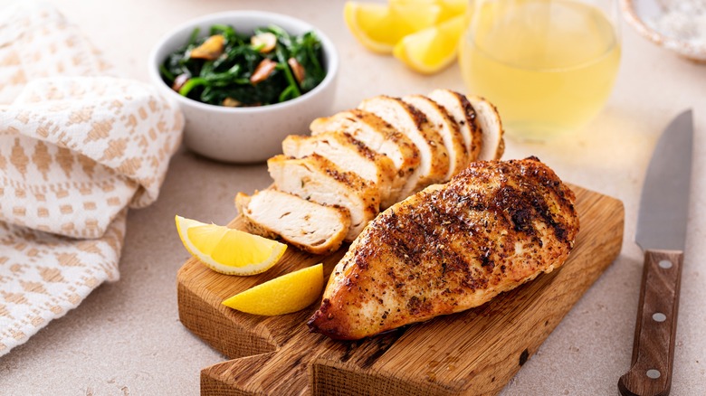 Grilled chicken breast and lemons
