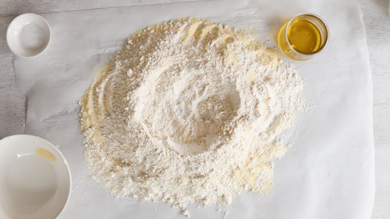 flour formed in a well for pasta making