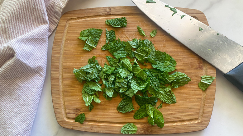 chopped mint on board