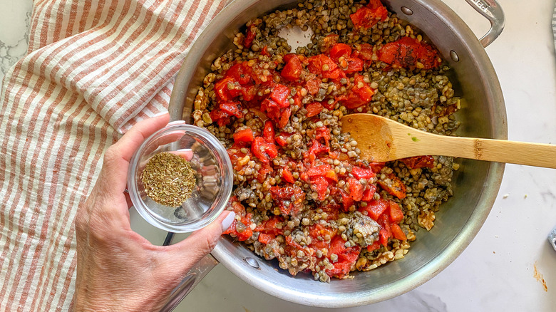 lentils in pan with tomatoes