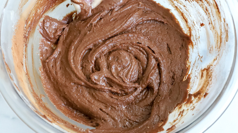 chocolate batter in clear bowl