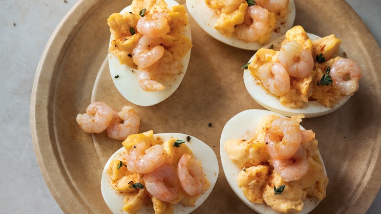 deviled eggs topped with shrimp