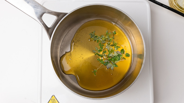 honey and thyme in saucepan