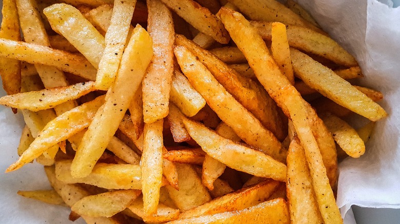 Close-up of frozen fries on tray