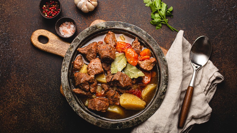 Beef stew, salt, pepper, and garlic