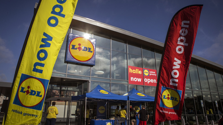 Lidl store front with welcome signs, tents