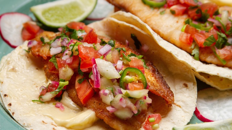 Close up of tacos with salsa, cilantro