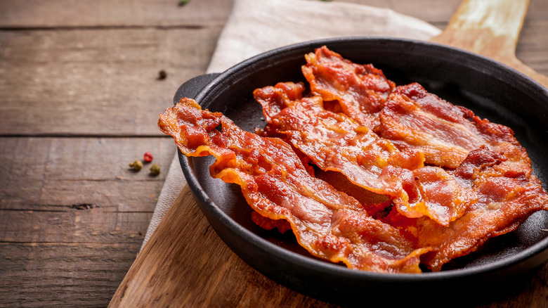 crispy bacon in a frying pan