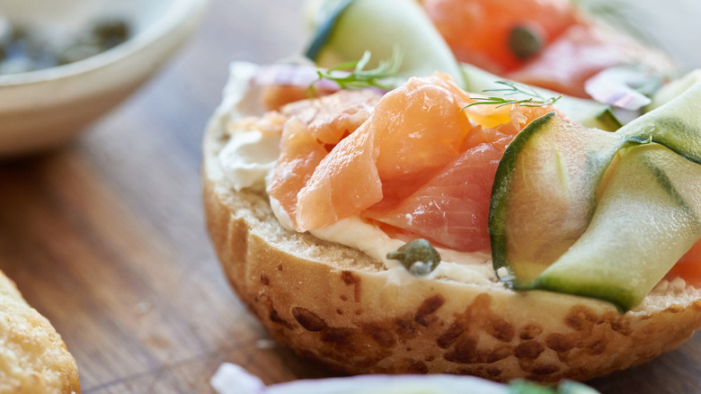 bagel with lox and cucumbers