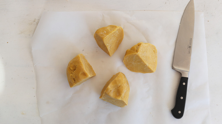 pasta dough cut into fourths