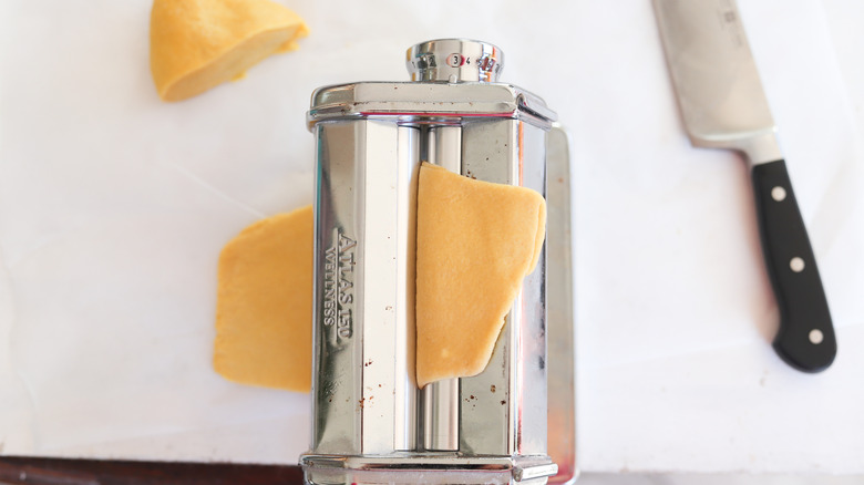 pasta dough in a roller