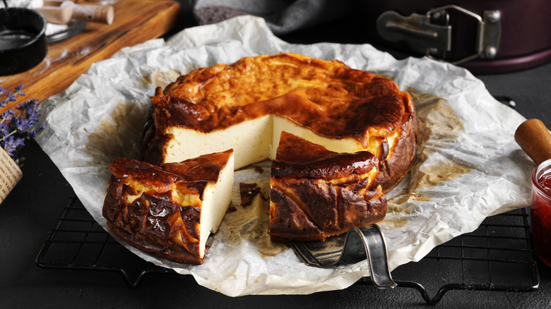 Basque burnt cheesecake on top of crinkled parchment paper