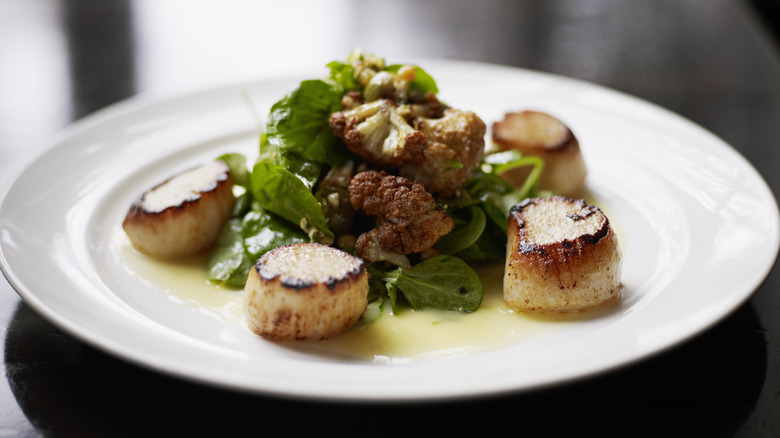 Seared Alaskan scallops, roasted cauliflower, gremolata, mache