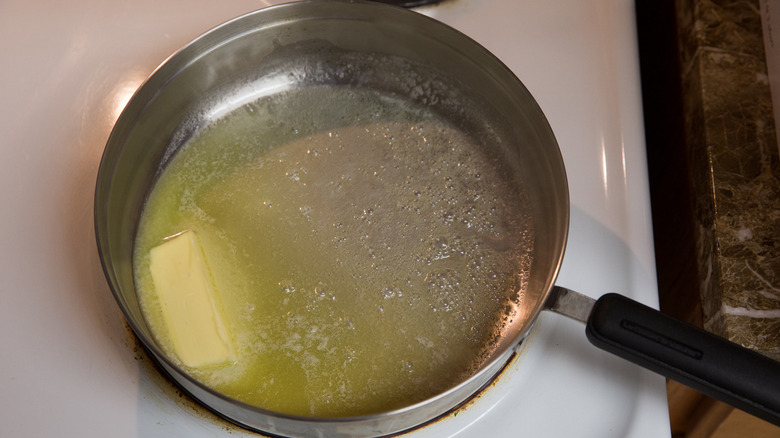 melted butter in skillet