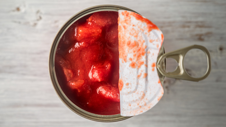 half open can of tomatoes