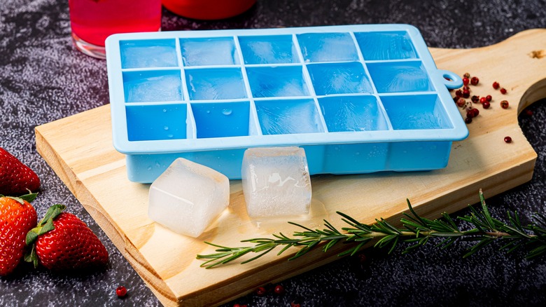 Blue ice cube tray by herbs