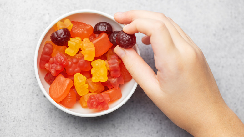 Fruit snack gummies in a white bowl