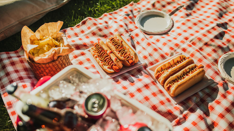 hot dogs on a picnic table