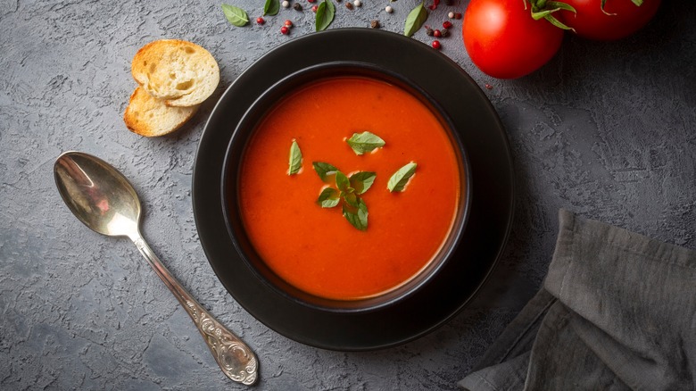 Plate of tomato soup with garnish