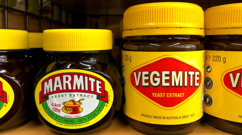 a jar of Marmite and Vegemite on the store shelf