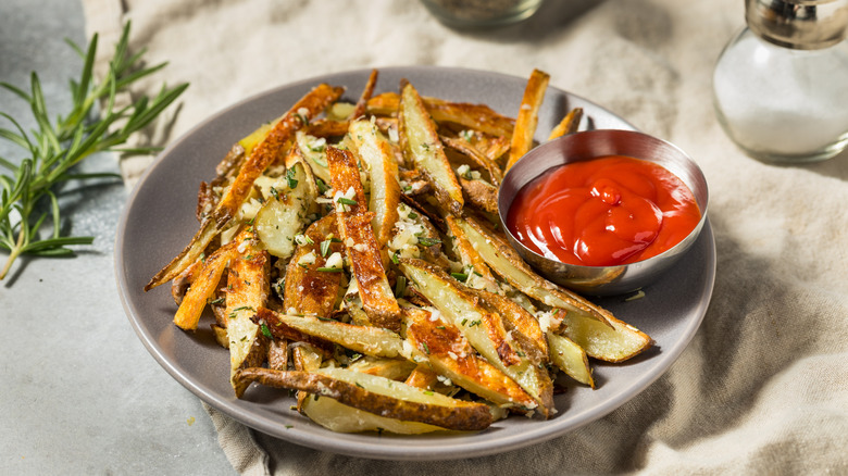 Garlic parmesan fries with a dipping sauce