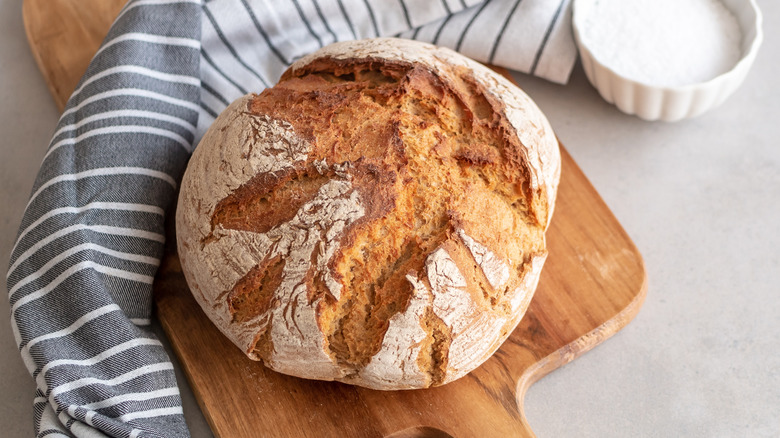 homemade crusty bread on cloth