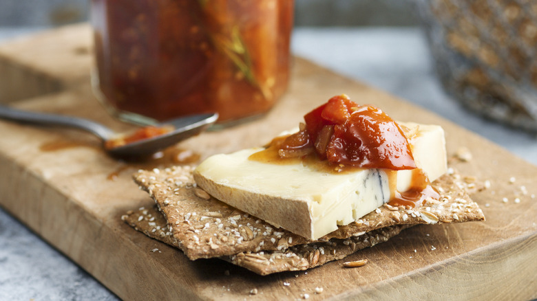 tomato butter on cheese crackers