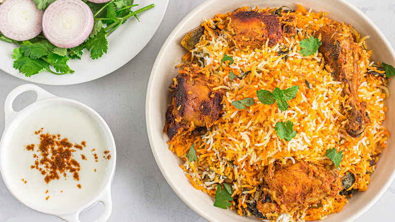 Chicken biryani garnished with fried onions