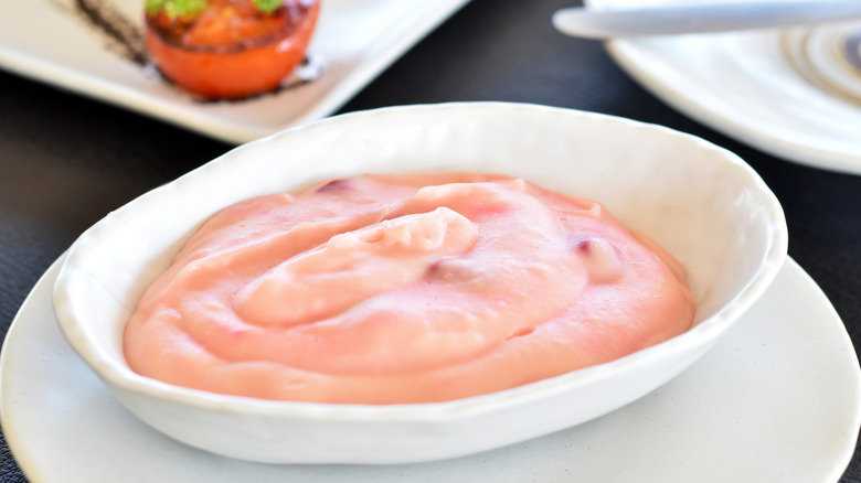 pink mashed potatoes in white bowl