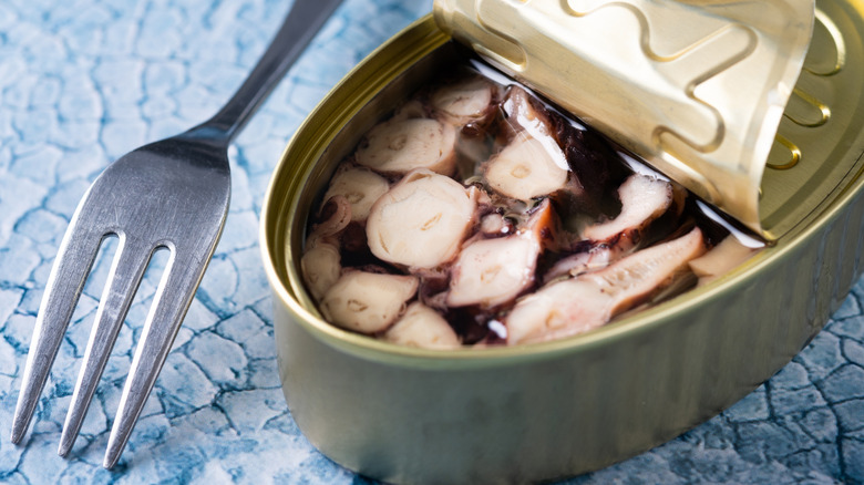 Canned octopus and fork