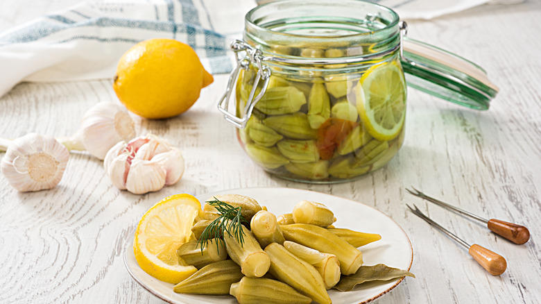 Pickled okra in a jar and on plate