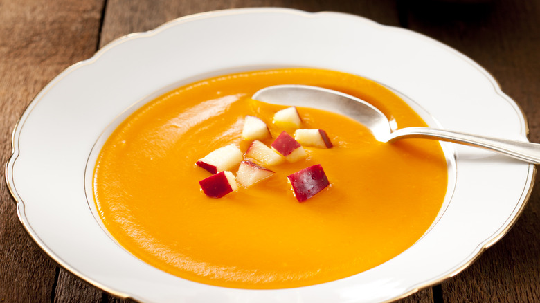 pumpkin soup with apple garnishes