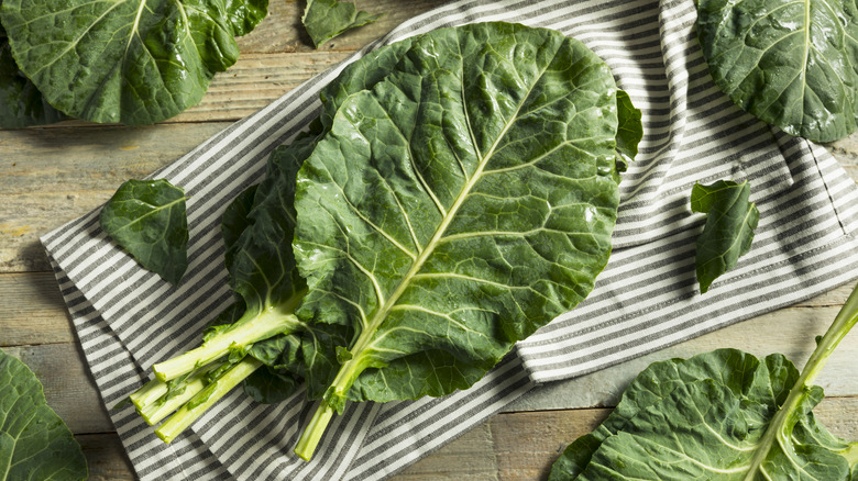 raw collard greens on table