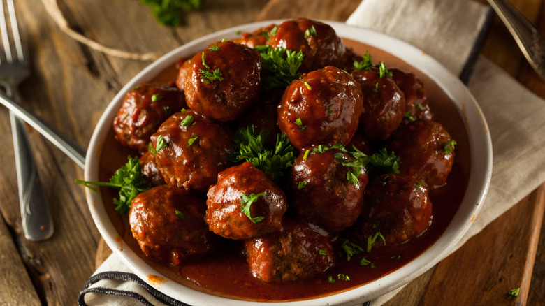 Meatballs with red sauce and parsley