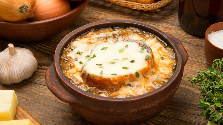 French onion soup in brown bowl