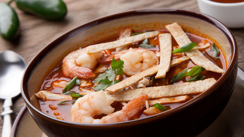 A close-up of shrimp tortilla soup