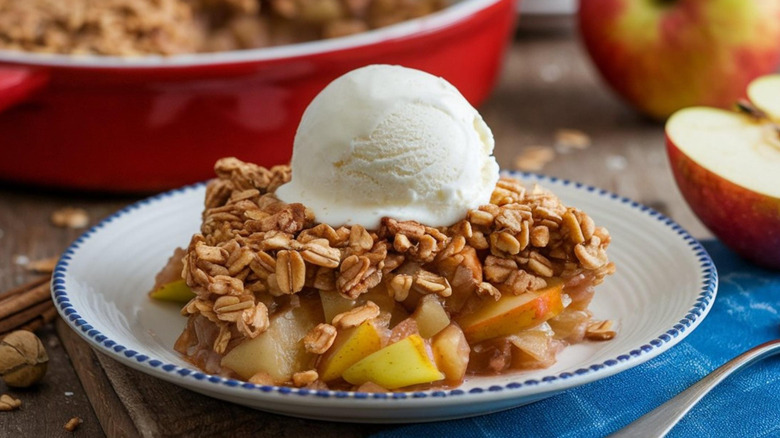 Apple crisp topped with ice cream