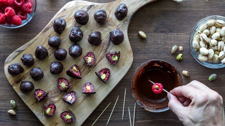 chocolate covered raspberries on board