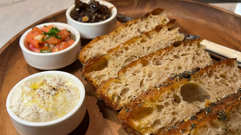 ricotta with onion jam, tomatoes, and grilled bread